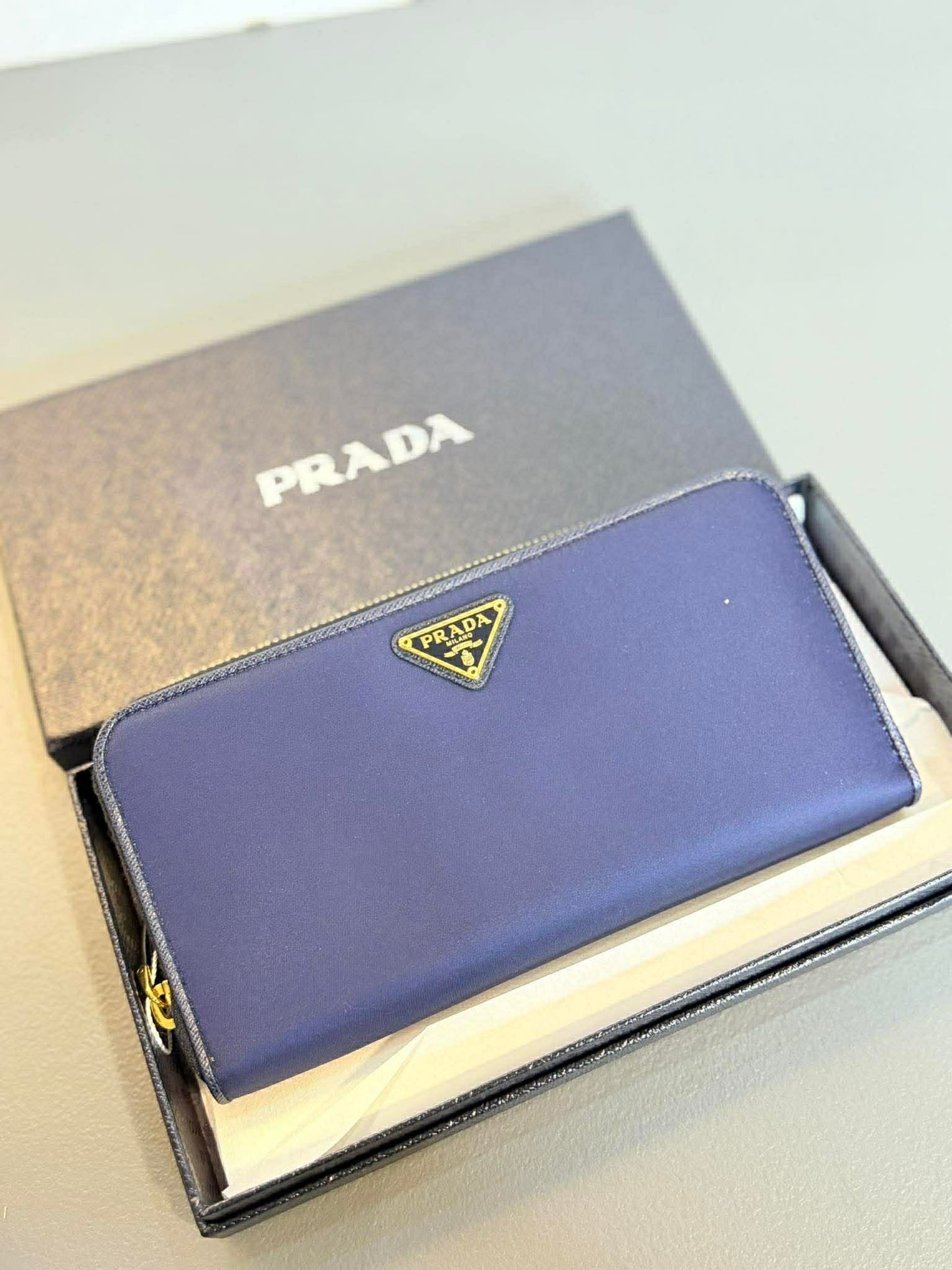 Prada – Triangle Logo Zip Around Wallet (Navy Blue)